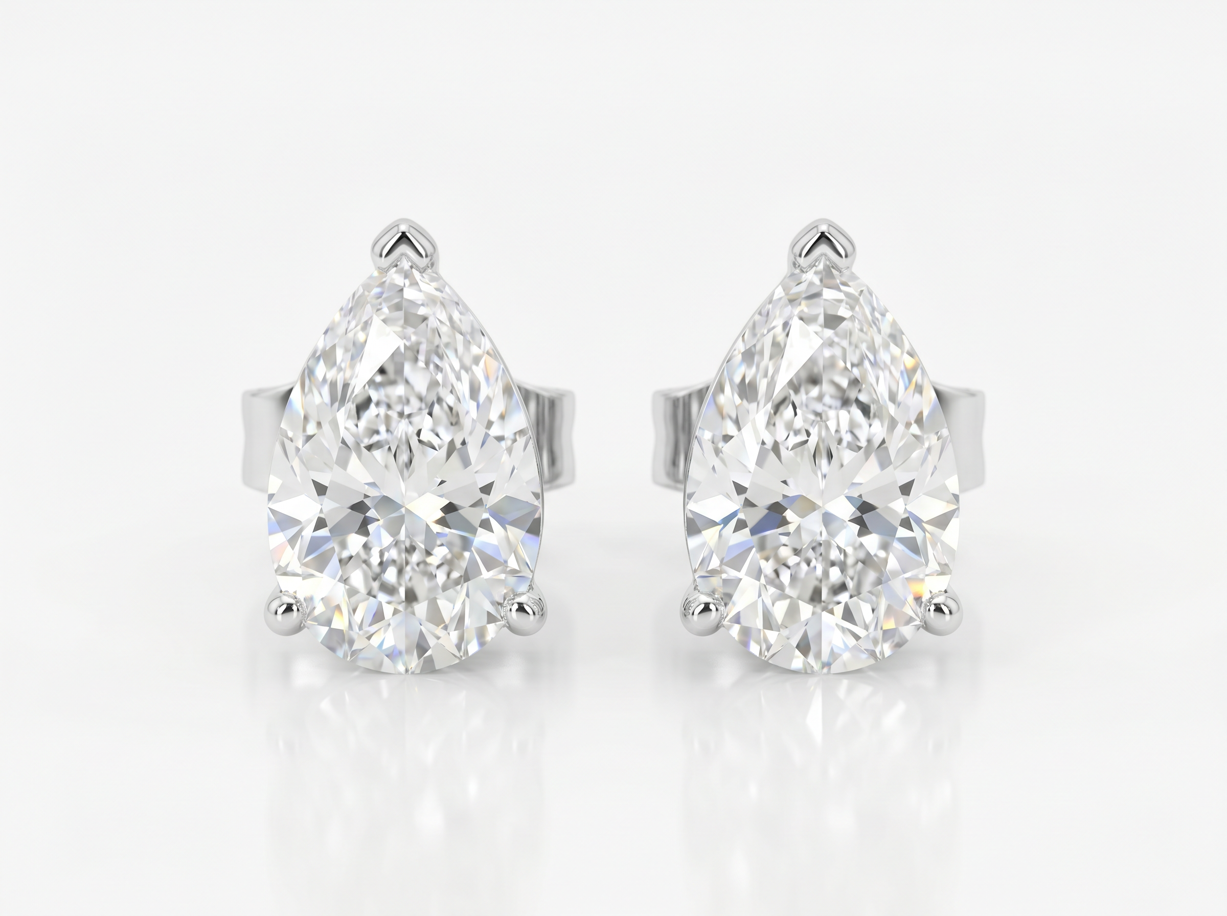 Pear Cut Diamond Stud Earrings in 18K white gold