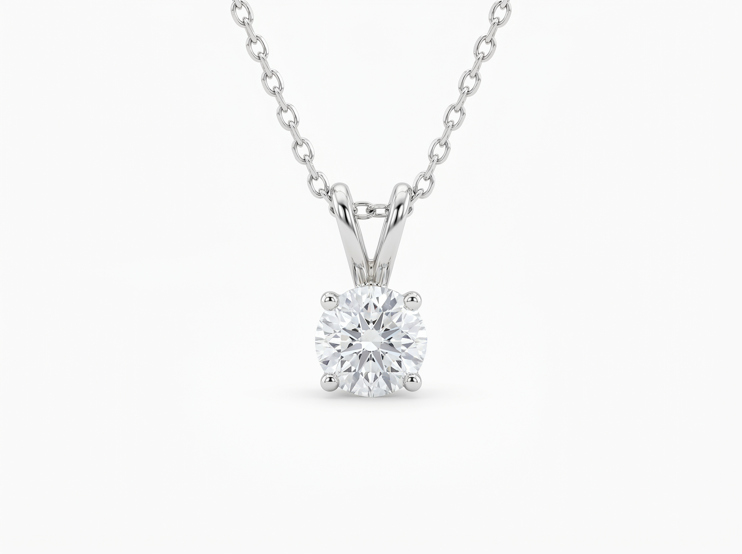 Four Prong Diamond Solitaire Pendant in 18K white gold